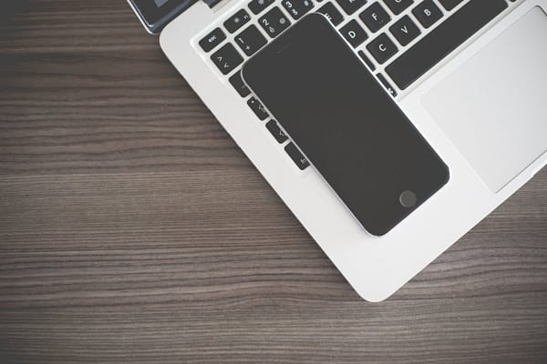 iPhone on MacBook Keyboard